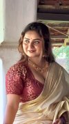 Busty-Malayali-model-big-breasts-and-tummy-in-kerala-saree-mkv-snapshot-00-15-751.jpg